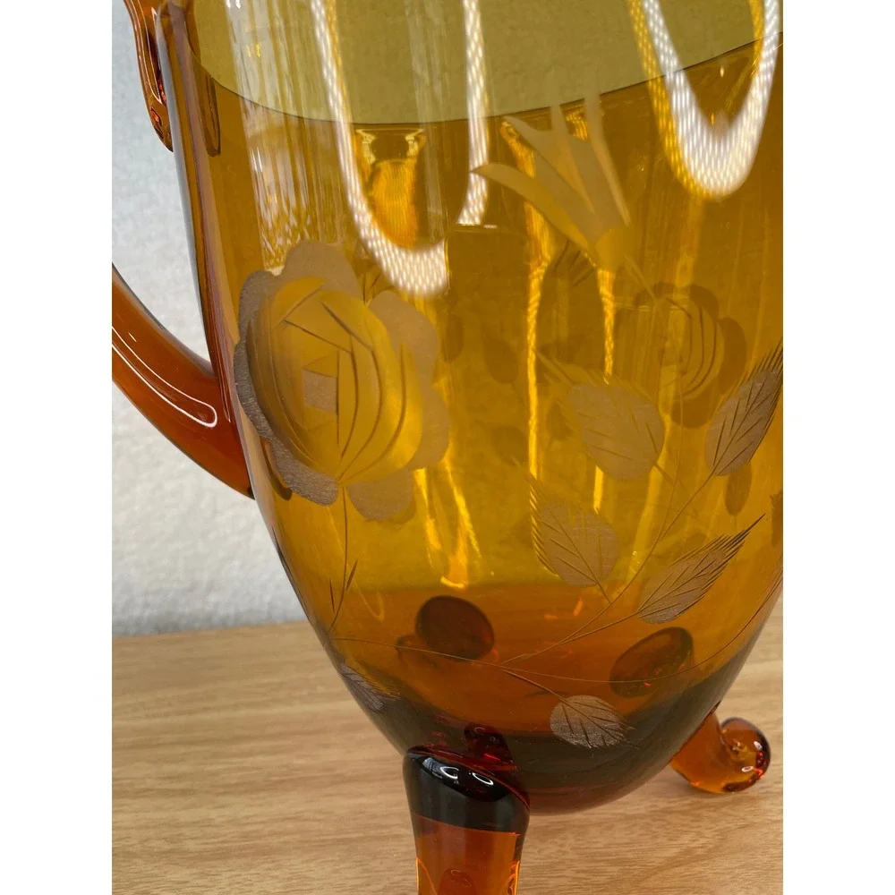 Vintage Amber Glass Pitcher Etched‎ Floral Rose Design 3-Footed Tripod 9.5 Inch